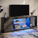 Wade Logan® Benigno 58" Media Console, LED TV Stand for 65 Inch TV, Gaming Entertainment Centre for PS5 w/ Glass Shelf Wood in Black | Wayfair