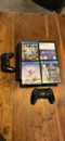 PS4 Pro 1TB Bundle - Two Controllers, Four Games + Cords!