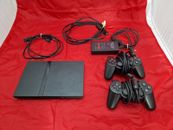 Playstation 2 con 2 controladores, cables, cámara, 4 zumbadores + adaptador