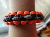 #34 kids 550 paracord and microcord bracelets, neon orange, gray and black