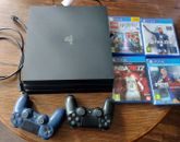 PS4 PRO Bundle.Sony Play Station 4 Pro Console with 2 controllers and 4 games 