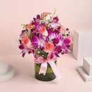 FlowerAura Decorative Bunch of Fresh Live 12 Pink Roses & 4 Purple Orchids Flowers Bouquet In Glass Vase Pot Valentine's Day Gift's For Girlfriend, Boyfriend, Wife & Husband (Same Day Delivery)