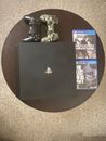 ps4 pro console 1tb used with Two Cd games 