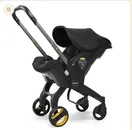 DOONA INFANT BABY CAR SEAT STROLLER & LATCH BASE NITRO BLACK ( NEW )