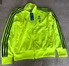 Adidas solar yellow tracksuit and Adidas orange hat. Small size. Brand New. 