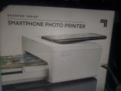 Mobile Photo Printer for smartphone by sharper image, one pack of photo paper.
