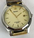 Vintage SEIKO MENS Day Quartz Silver/Gold Wristwatch 7N32-0061