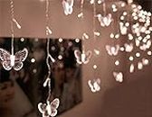 SHHE Fairy Lights 1.5M x 0.5M 48 LED Butterfly Curtain Lights String 230V UK Plug 8 Modes Indoor Outdoor Use for Party Wedding Christmas Holiday Decoration Lighting(Warm White)