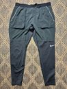 Pantalones de correr Nike utilitarios para hombre negros/blancos AJ7959 talla grande