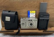 Canon PowerShot Digital ELPH S200 2.0MP Camera Battery, Charger And Case