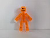 Figurine articulée orange fluo ventouses robot Stikbot 8 cm
