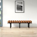 Wade Logan® Boutis Faux Leather Upholstered Bench Wood in Black/Brown | 19 H x 60.5 W x 19.5 D in | Wayfair 5C236A58639E4008A06761B3F57937AA