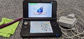 Nintendo 3DS XL Red and Black Handheld System (And 30 3DS Games)