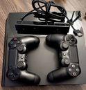 Sony PlayStation 4 con 2 controladores y paquete de cámara de realidad virtual - sin cables