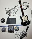 Consola Playstation 2 con guitarra y micrófono con cable y paquete de 4 juegos PS2 Rockband