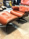 Eames look reproduction chair and stool....Real Leather and walnut veneer