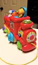 VTech Roll & Surprise Animal Train Lights And Plays 55 Songs