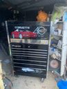 snap on tool box with a Few tools