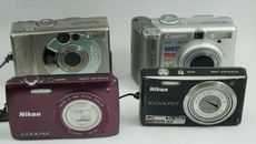 Digital Cameras -FOUR FOR PARTS OR REPAIR -NIKON AND CANON DIGITAL CAMERAS