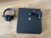 PS4 Pro console bundle. Games, remotes and headset included. 