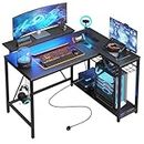 Bestier L Shaped Desk with Power Outlets & LED Lights Compact Corner Desk with Shelves Reversible Computer Desk with Hooks for Home Office Bedroom Small Space 106.5CM