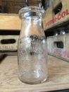 Botella de leche vintage de media pinta hoja de trébol lácteos Elmhurst Illinois