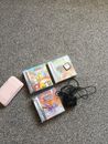 Console e caricabatterie originali Nintendo DS rosa. Funziona con 4 giochi 