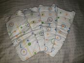 (4) Samples of Tippy Toes Size 7 Diapers for Girls or Boys 41 LBS+