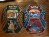Juego de 2 latas jarrones Pokémon Salamence y Dragonite selladas 2019 XY Evolutions SM