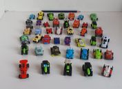 A set of 42 kinder car toys that are different from each other. 