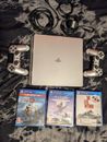 Playstation 4/PS4 slim silver/grey console bundle with 2 controllers and 3 games
