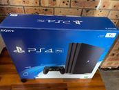 ps4 pro 1tb console with 2 controllers LIKE NEW
