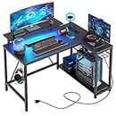 Bestier Small L Shaped Gaming Desk with Power Outlets, 42 inch Computer Desk with Storage Shelves Reversible Corner Gamer Desk with Monitor Stand & Headset Hooks Carbon Fiber Black