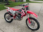 Dirt bike. Red 2014 Honda CRF 450. Barely Used, Solid Condition. Garage Kept. 