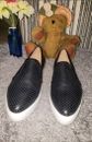 Women's Black leather slip on shoes