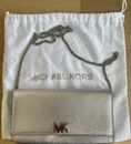 Michael Kors Silver Bag With Detachable Silver Strap And MK Closure.