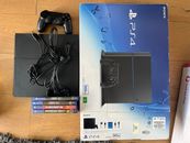 Playstation 4 500GB console with new power supply and 5 games