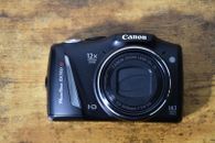 Canon PowerShot SX150 IS fotocamera digitale con custodia e manuale stampato