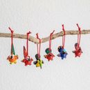 The Holiday Aisle® Jose Arriola 7 Piece Christmas Bird Handmade Hanging Figurine Ornament Set Ceramic/Porcelain in Black/Red/Yellow | Wayfair
