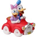 Precious Moments Disney Collectible Parade Daisy Duck & Donald Duck Resin Figurine Resin in Red | 4 H x 2.5 W x 3.25 D in | Wayfair 201702