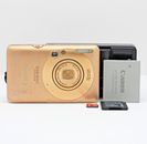 Canon IXUS 100 IS 12,1 megapixel fotocamera digitale compatta oro testata con scheda SD 16 GB