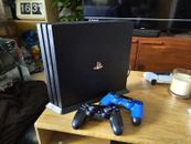 Sony PlayStation 4 Pro 1TB Console - Black - Cables, 2x Controllers Included