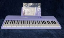 The ONE Smart Keyboard Purple 61 Keys Piano Music Built-in LED Lights/Free Apps