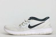 Zapatos deportivos para correr Nike Free RN para mujer blancos/negros talla 7,5 EE. UU.