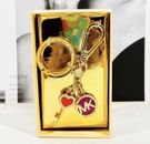 Michael Kors gold tone purse charm keychain charm