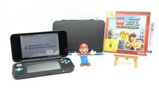 New Nintendo 2DS XL Spielekonsole inkl Spiel & Tasche - OVP - Schwarz/Türkis