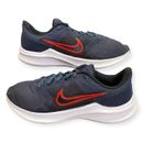 Nike Turnschuhe Sportschuhe Erwachsene UK 7 Downshifter blau rot CW3411-400