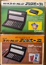 Boxed CASIO computers AX-1 and AX-2