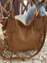 large tan with orange high lights leather fossil cross body tote bag