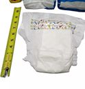 5 plastic backed diapers 